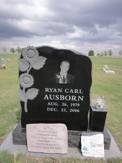 Headstones with two sunflower designs
