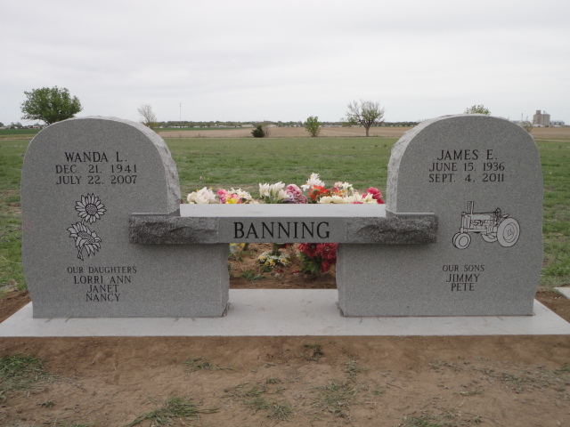 Two connected headstones