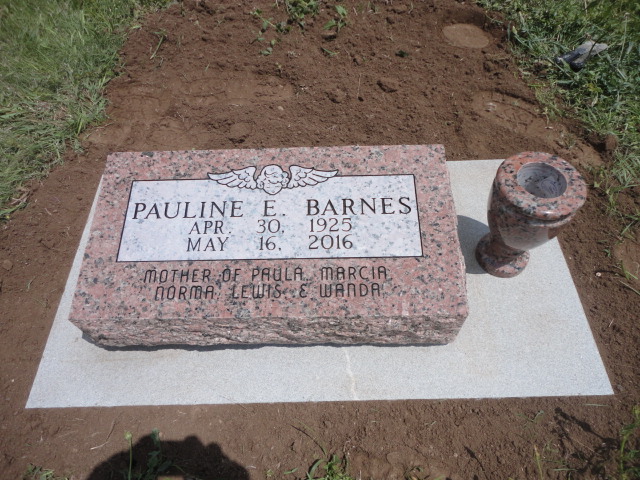 A headstone on a ground
