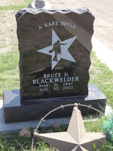 A jagged headstone with a star
