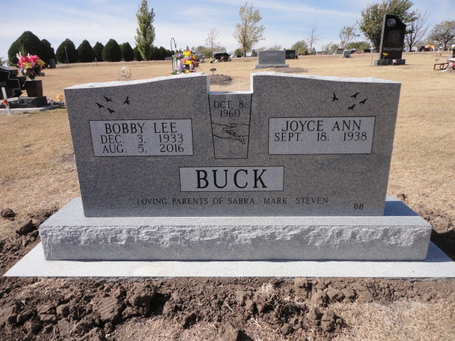 A headstone for the Buck couple