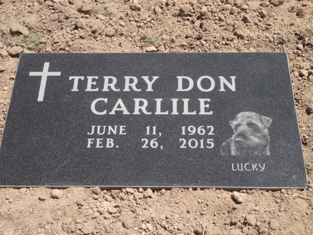 A small headstone for Terry Carlile