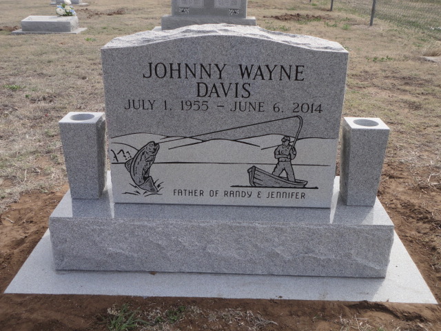 A headstone with a fisherman design
