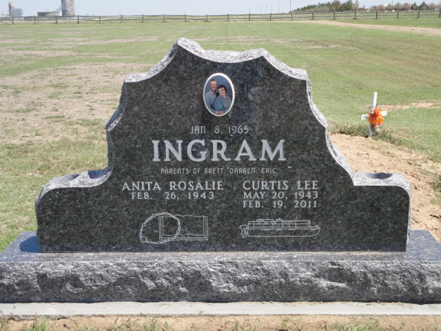 An uneven headstone for Anita and Custis Ingram